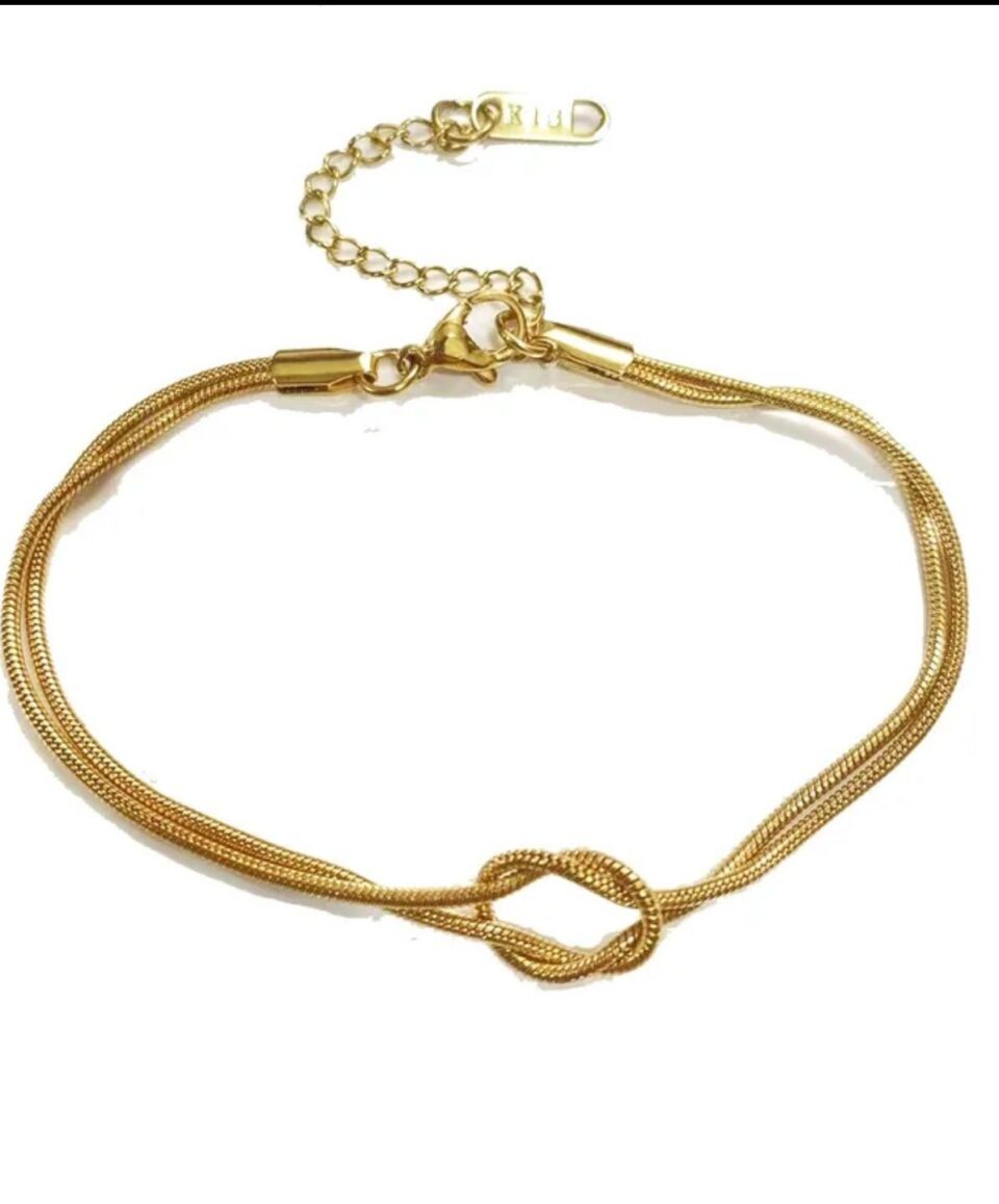 Pulsera elegante de nudo color oro